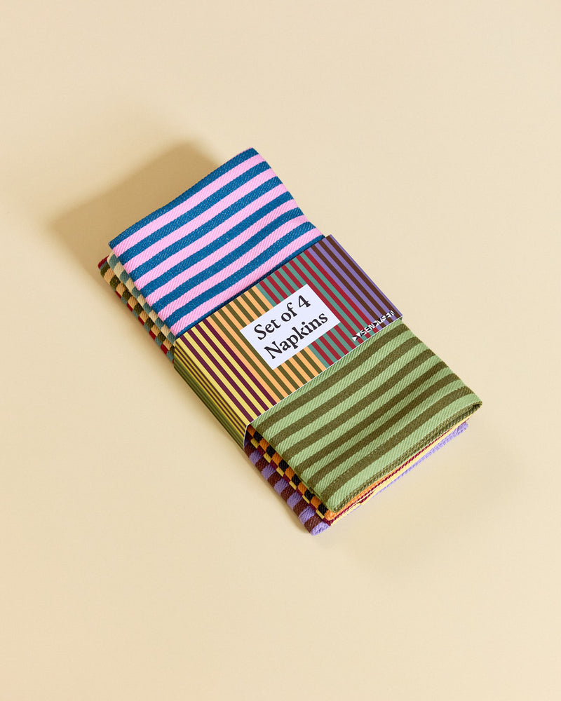 Set of 4 Napkins 2025 Stripe in packaging on beige background