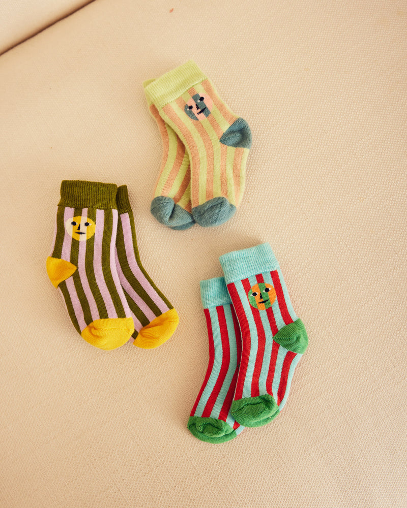 three striped socks with Everybody face on them 