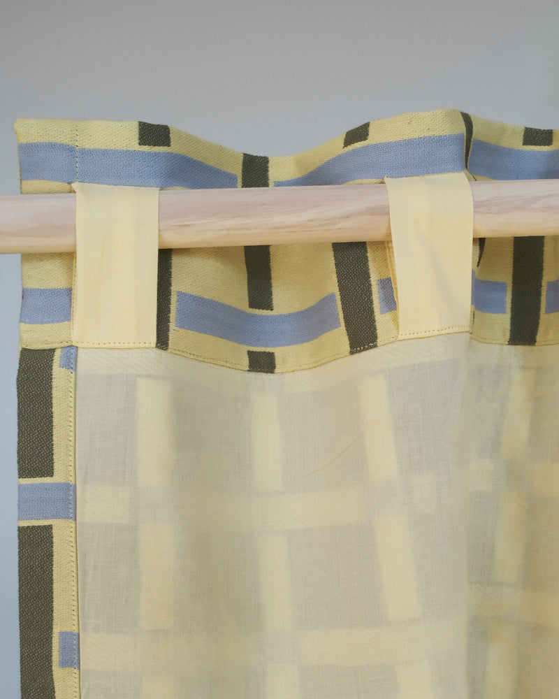 Curtain with back tab hanging