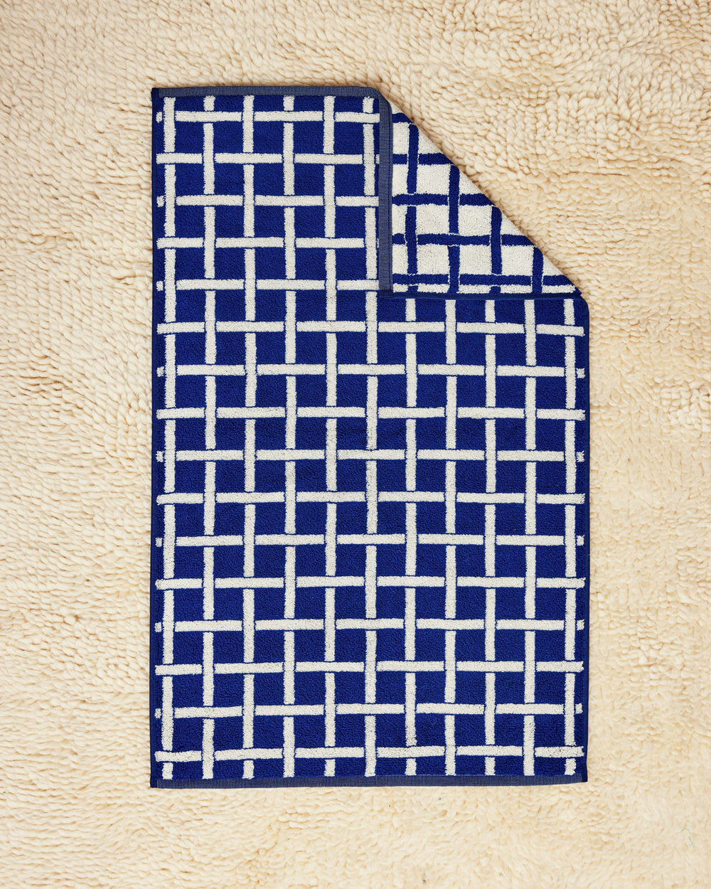 100% cotton towel. Tabby Towel Flat on a cream rug 