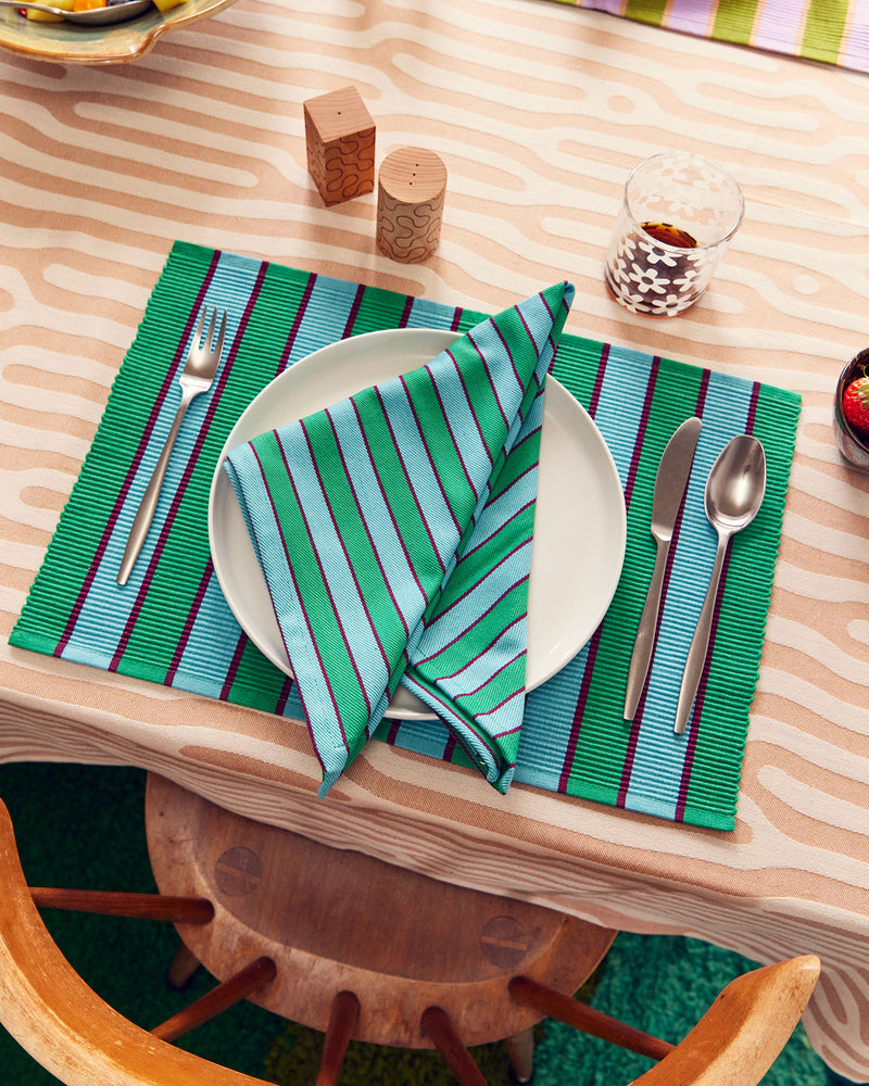 Dusen Dusen Herb Stripe Placemats. Single or Set of 4 placemats in mix and match striped patterns. Cotton placemats in tri-color stripes with a ribbed texture. 100% cotton, 12" x 18". Machine wash cold and lay flat to dry. Spot clean as needed. Made in India.