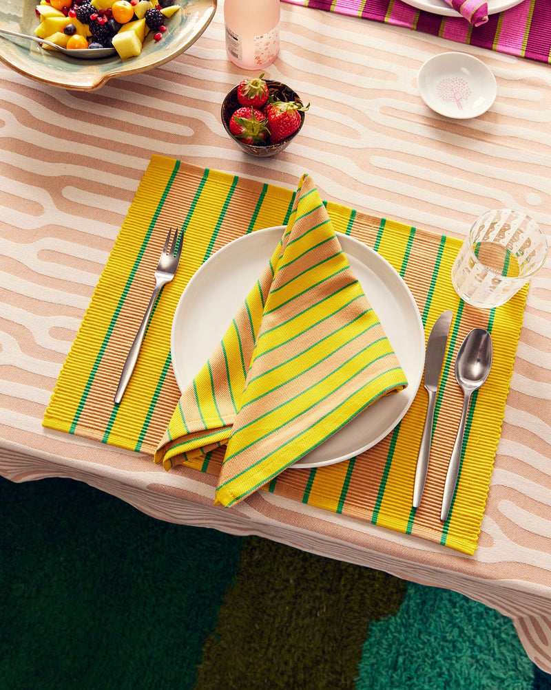 Dusen Dusen Herb Stripe Placemats. Single or Set of 4 placemats in mix and match striped patterns. Cotton placemats in tri-color stripes with a ribbed texture. 100% cotton, 12" x 18". Machine wash cold and lay flat to dry. Spot clean as needed. Made in India.