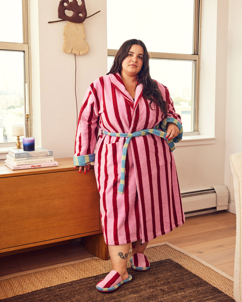 Carmen in pink and red robe with matching slippers