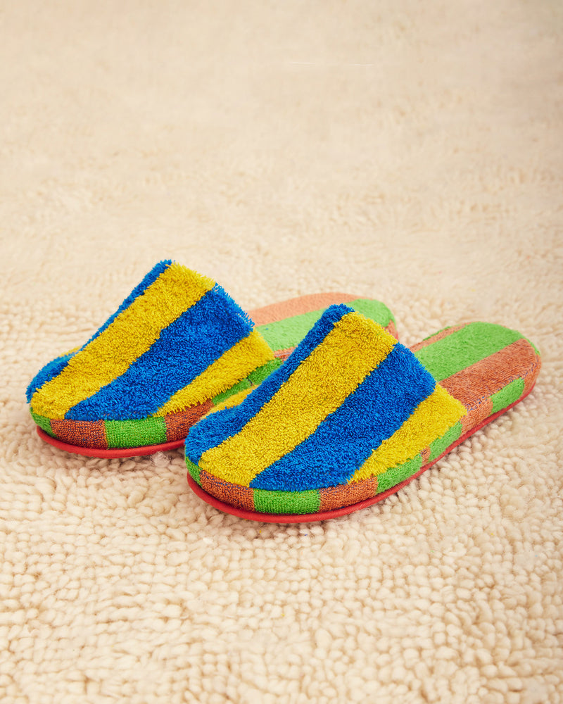 Dusen Dusen Stripe Slippers in Reef. Contrasting stripes and colorways on the outer shell and plush inner sole. 95% Cotton, 450gsm and 5% Polyamide/Nomex/Meryl. This item is Oeko-Tex Standard 100 certified (no harmful chemicals were used during production). Made in Portugal.