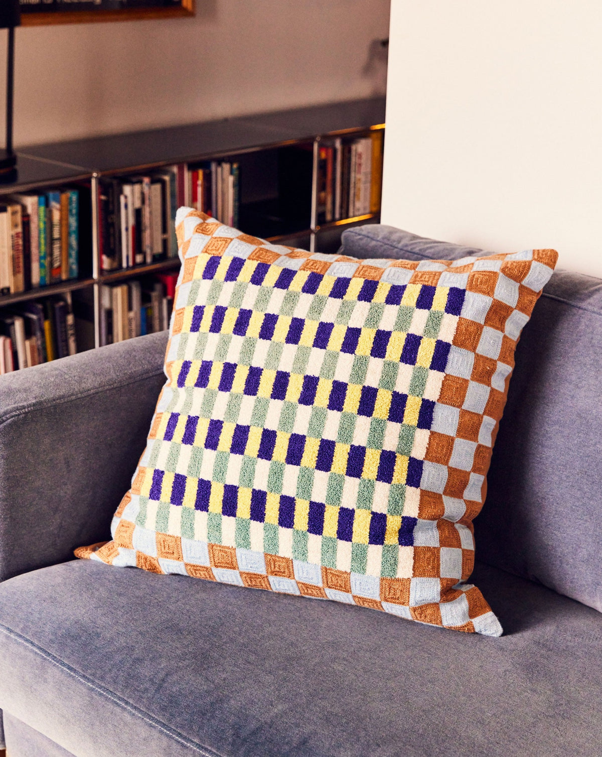 Dusen Dusen Basket Pillow. Basket pillow in multi-color check print. 100% cotton tufted pillow. Natural canvas back with zip closure. Available as 24" x 24". Spot clean only. Made in India.