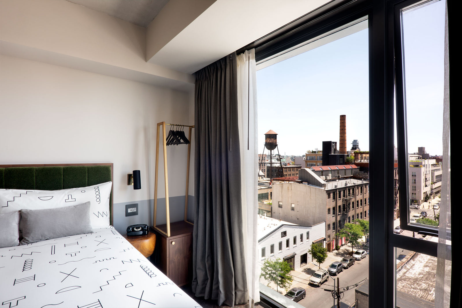shot out of hotel window with dusen bedding in corner