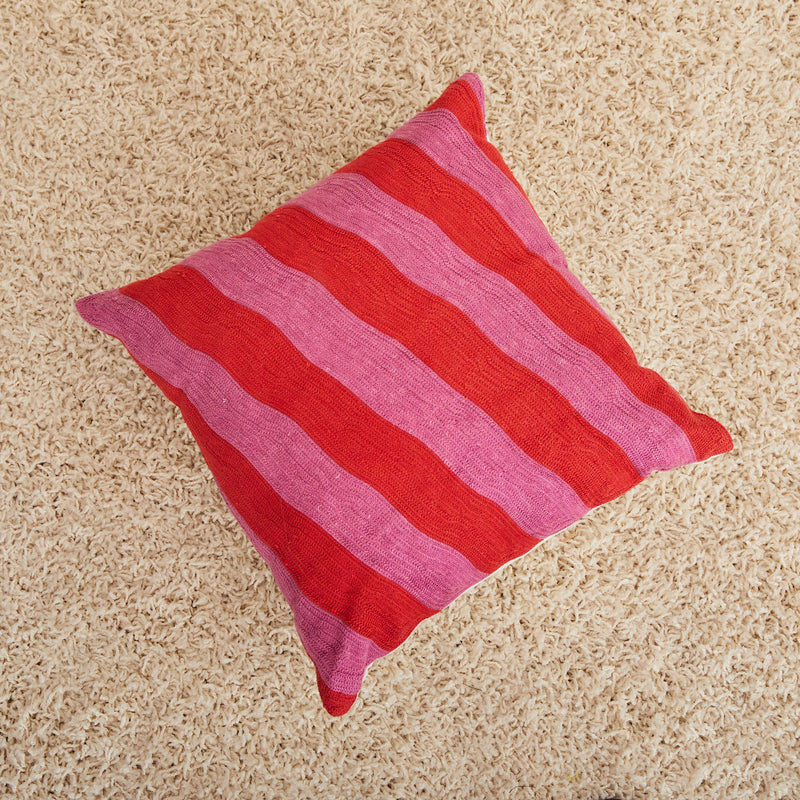 Dusen Dusen Stream Pillow. Pink tonal stripes in 100% cotton embroidery. Non-embroidered natural canvas back with a zipper opening. Made in India.